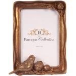 goudkleurige fotolijst vogel staand